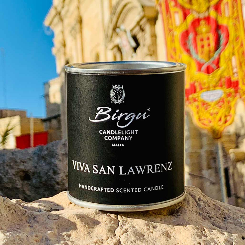 Scented candle Viva San Lawrenz outside the Church of St. Lawrence during the Feast of St. Lawrence in Birgu, Malta. August 2021